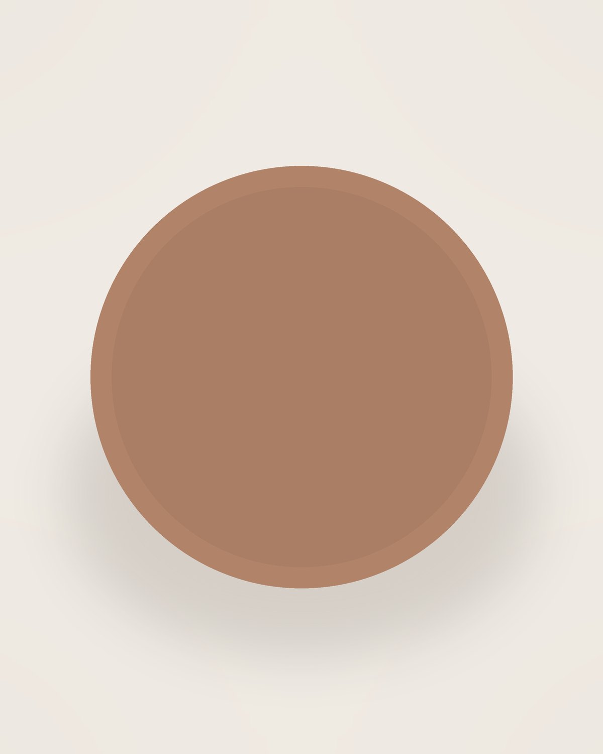 Arco Dinner Plate in Clay, front view on a neutral backdrop