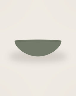 Arco Low Bowl in Moss, front view on a neutral backdrop