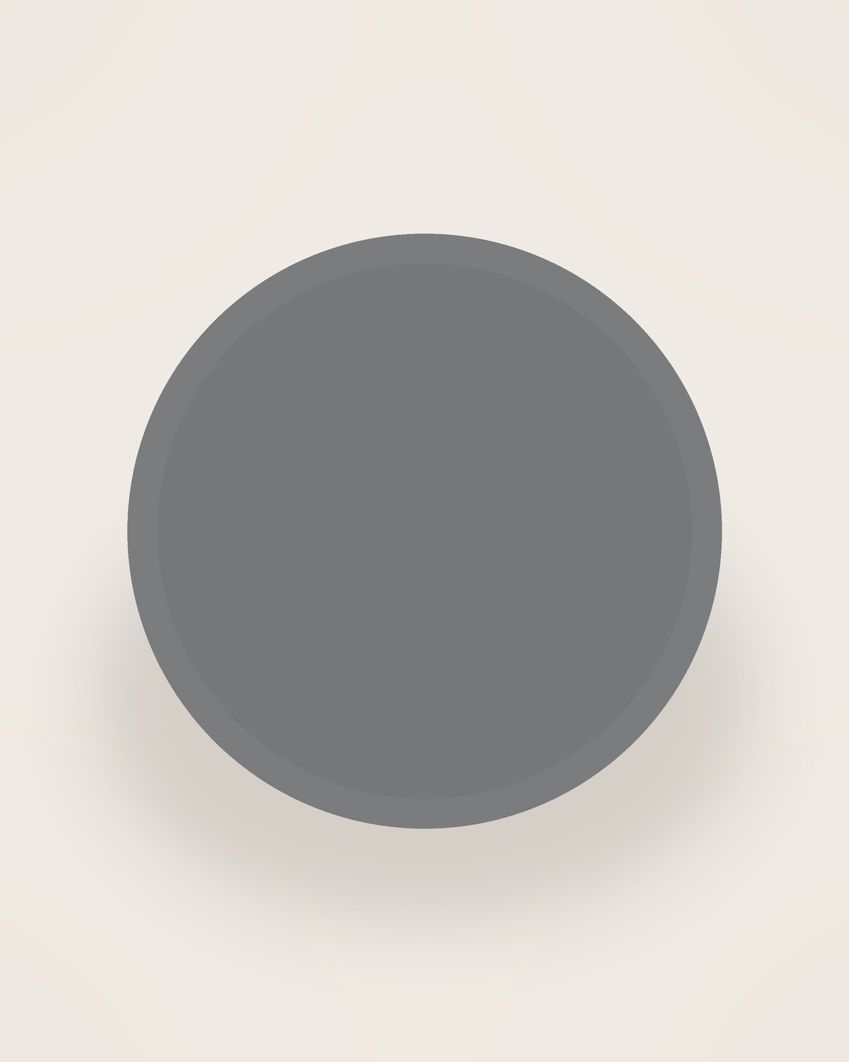 Arco Side Plate in Slate, front view on a neutral backdrop
