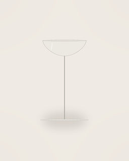 Sera Champagne Coupe in Clear, front view on a neutral backdrop