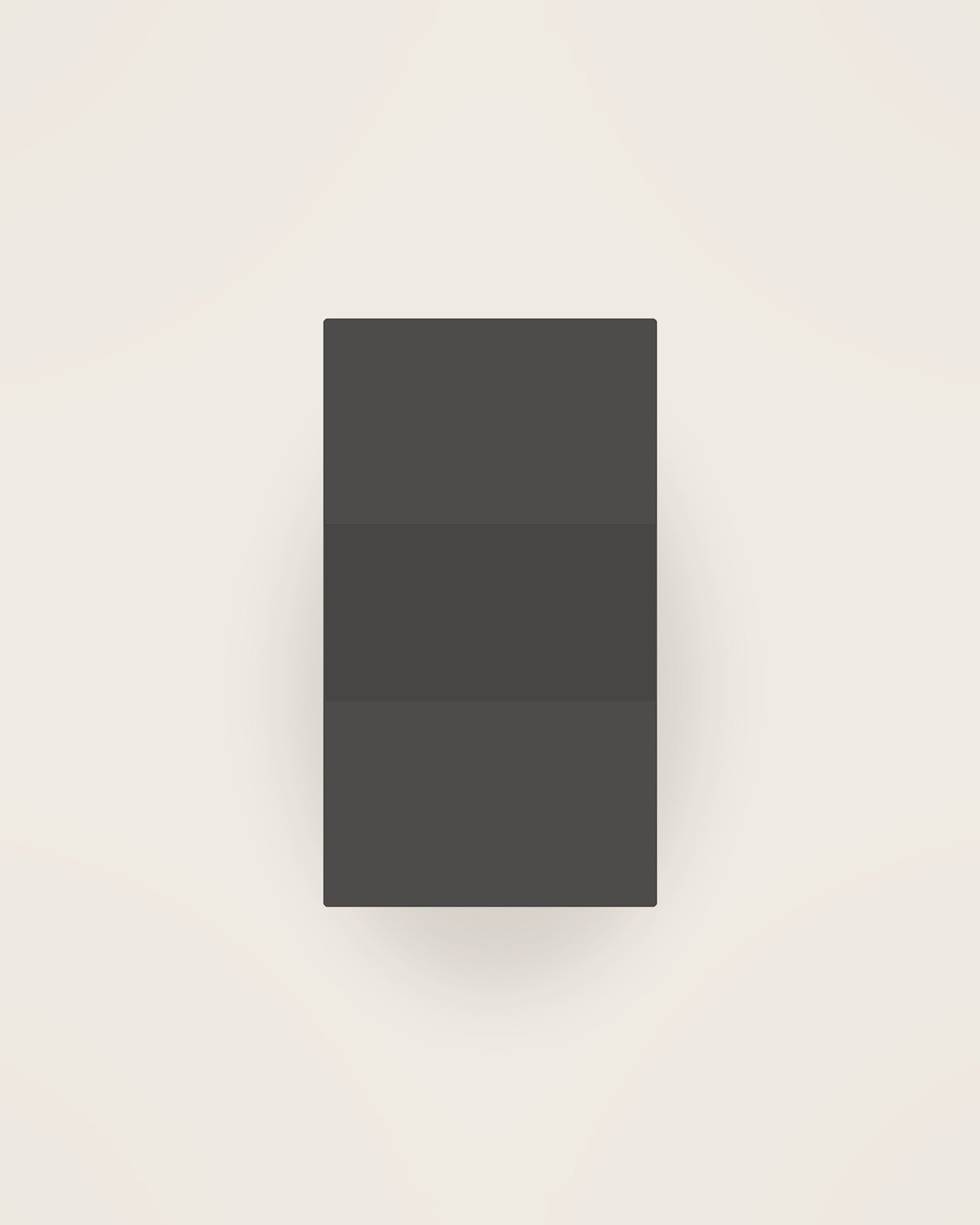 Tela Linen Apron in Charcoal, front view on a neutral backdrop