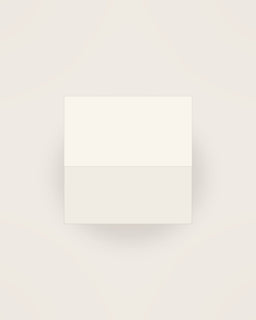 Tela Linen Napkin in Chalk, front view on a neutral backdrop