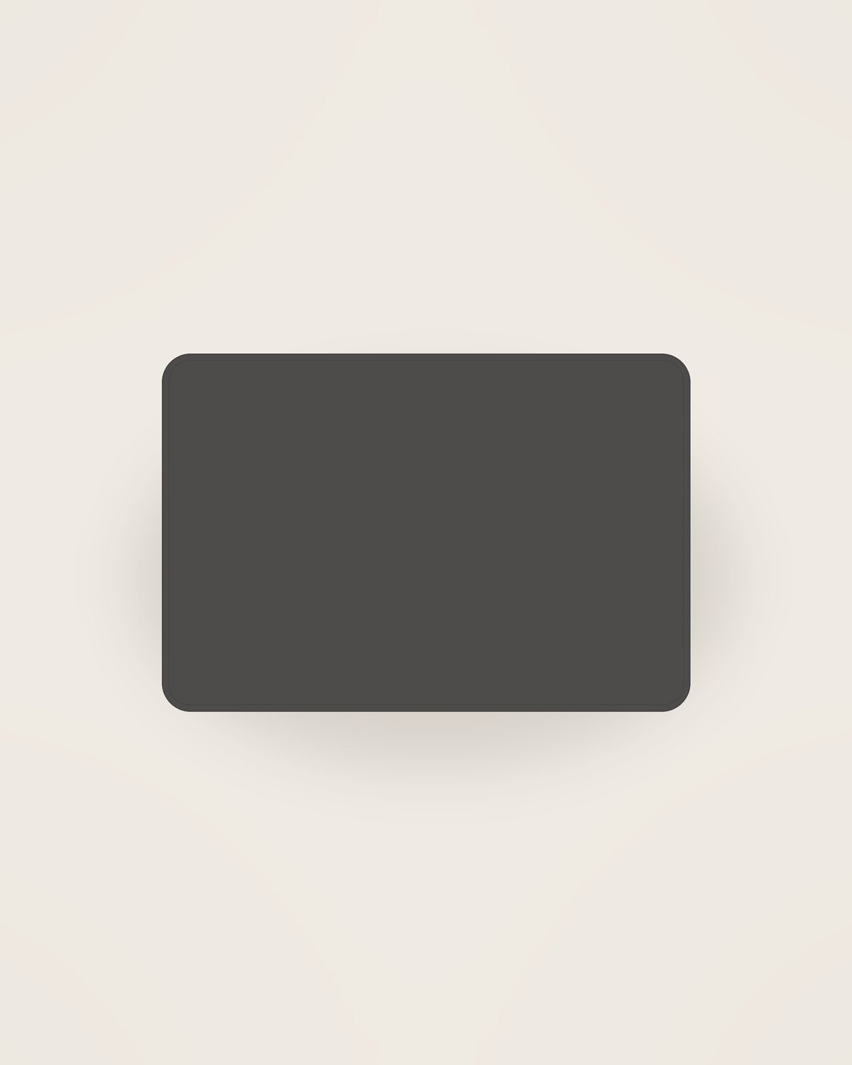 Tela Linen Placemat in Charcoal, front view on a neutral backdrop