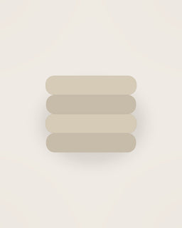 The Linen Table Set in Natural, front view on a neutral backdrop