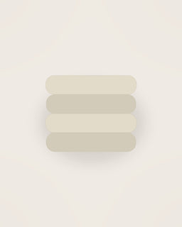 The Linen Table Set in Oat, front view on a neutral backdrop
